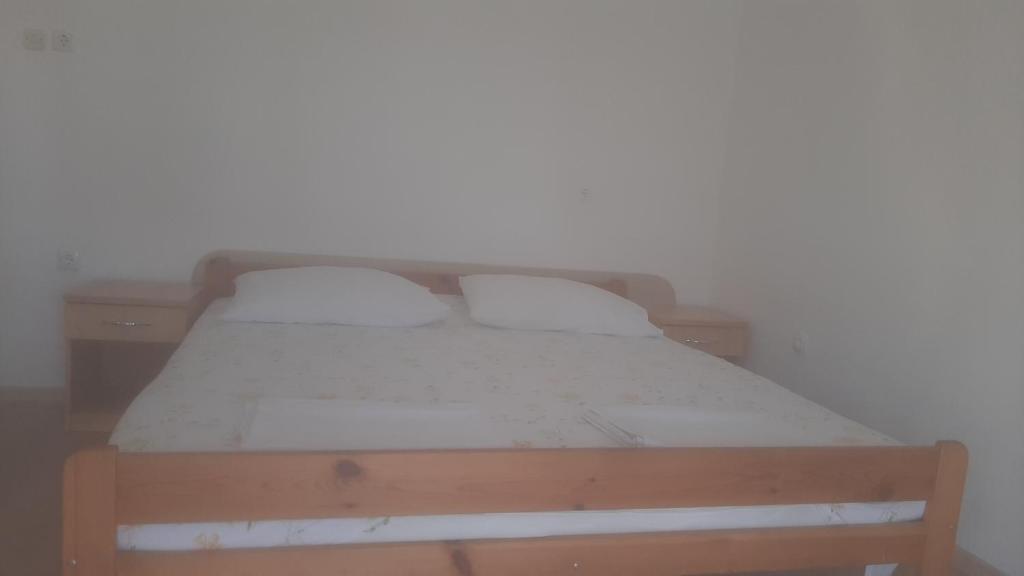 Postel nebo postele na pokoji v ubytování Basil Apartments and Rooms