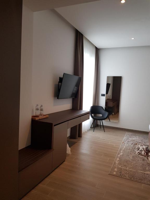 TV a/nebo společenská místnost v ubytování MY HOTEL