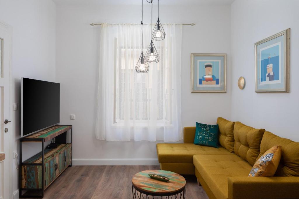Televízia a/alebo spoločenská miestnosť v ubytovaní Luxury apartment Toni
