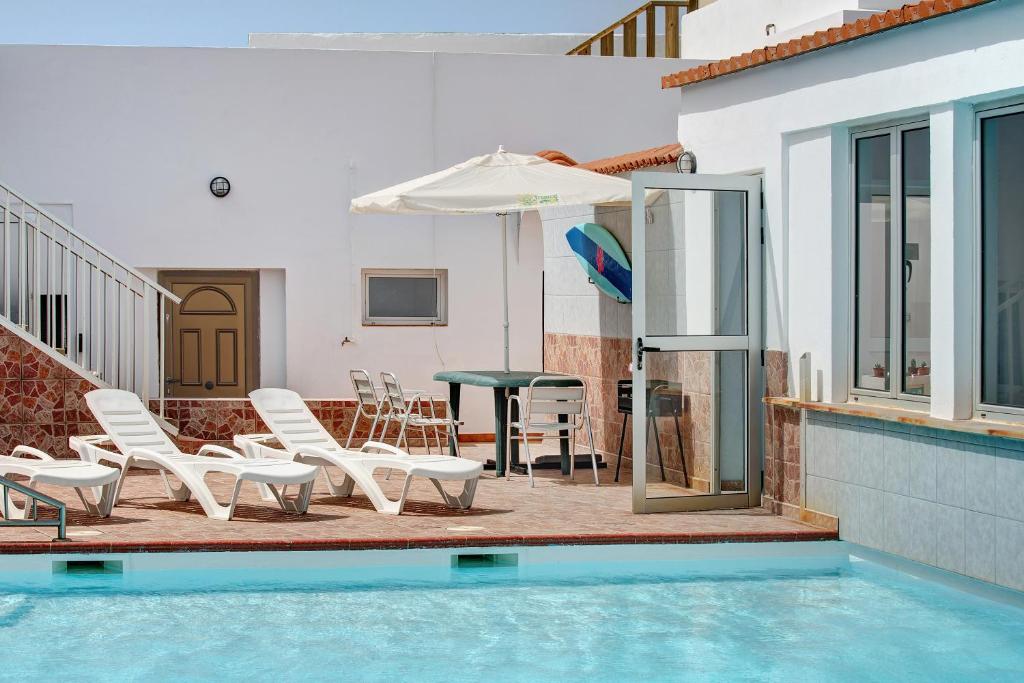 The swimming pool at or close to Casa Carmencita