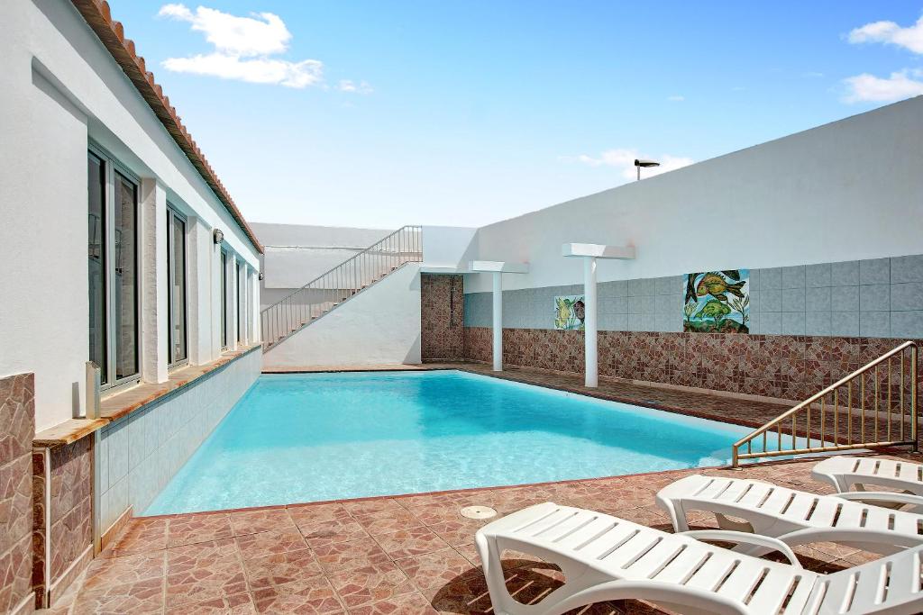 The swimming pool at or close to Casa Carmencita