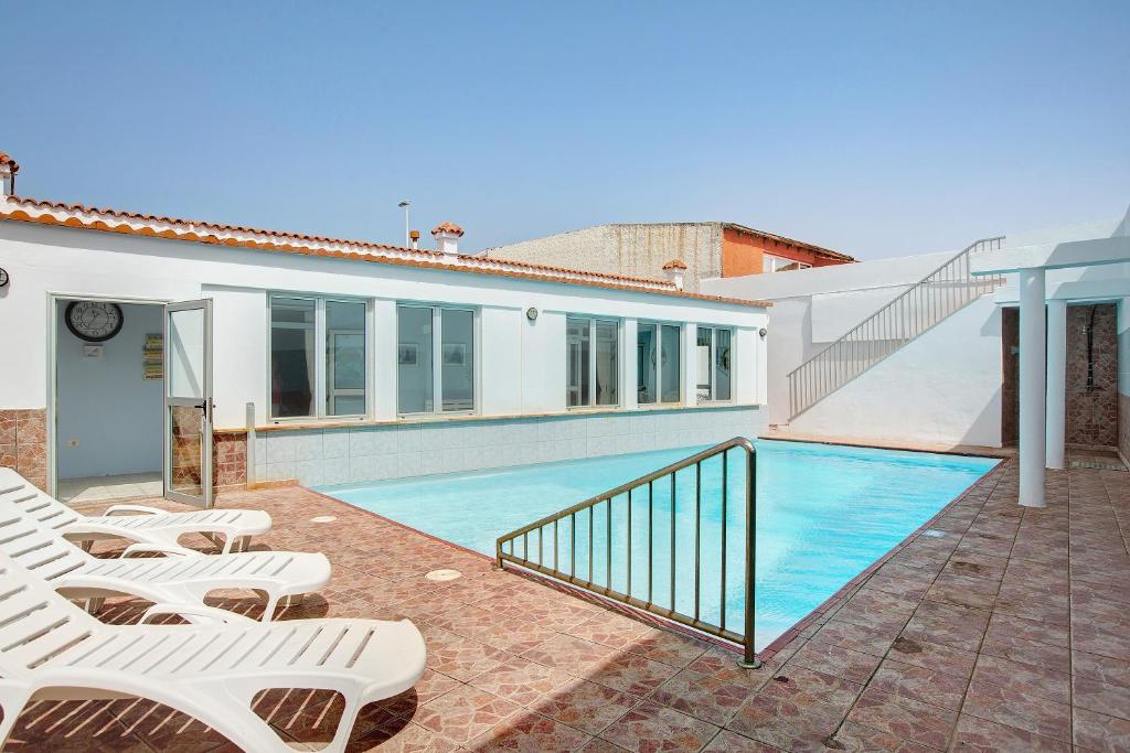 The swimming pool at or close to Casa Carmencita