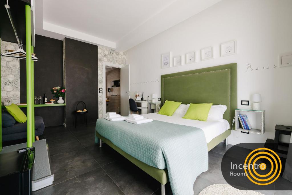 Postel nebo postele na pokoji v ubytování Incentro Rooms