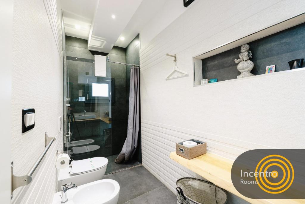Koupelna v ubytování Incentro Rooms