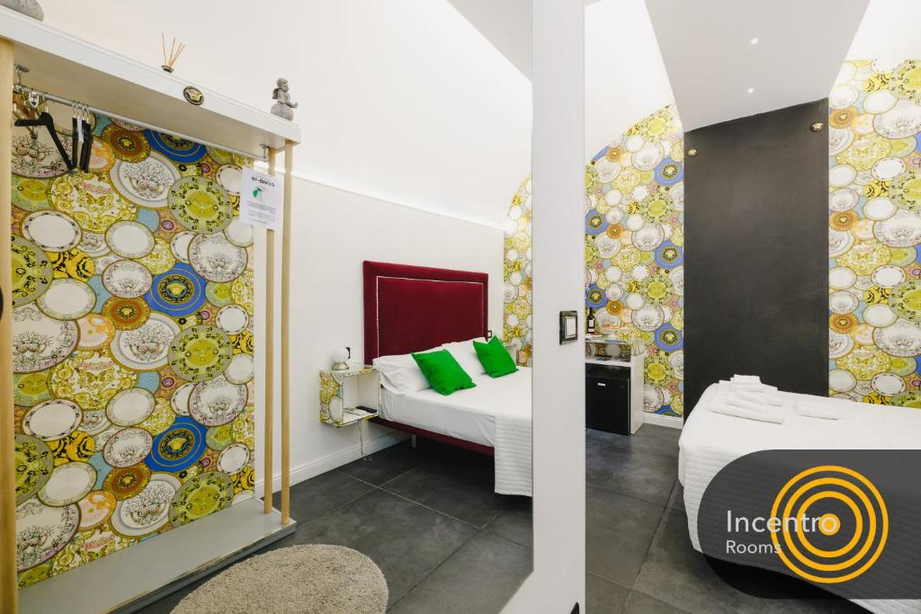 Postel nebo postele na pokoji v ubytování Incentro Rooms