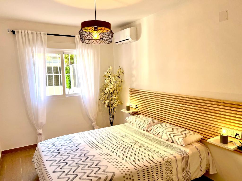 Postel nebo postele na pokoji v ubytování Albir21 Ground floor by Albir Proper Properties