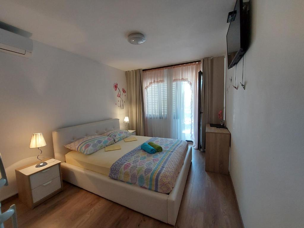 Postel nebo postele na pokoji v ubytování Guesthouse Adria