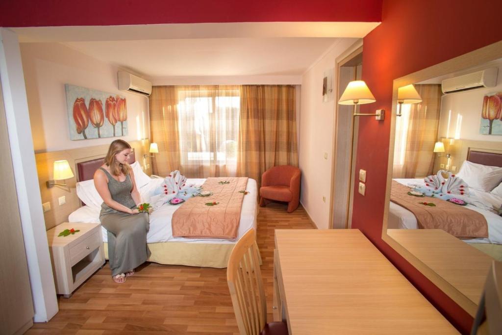 Posteľ alebo postele v izbe v ubytovaní Aegean View Aqua Resort