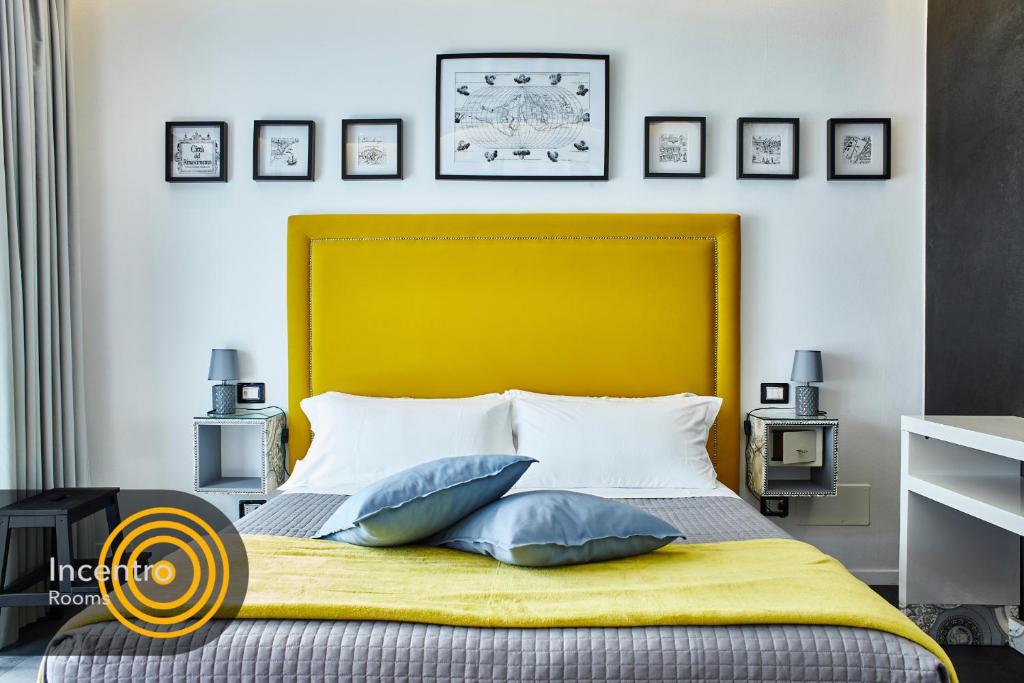 Postel nebo postele na pokoji v ubytování Incentro Rooms