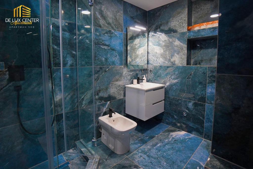 Koupelna v ubytování DeLux Center Apartments Inđija