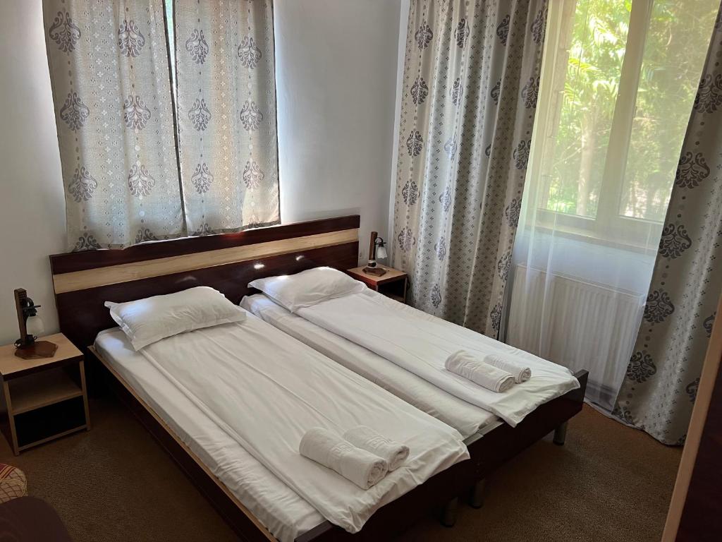 Postel nebo postele na pokoji v ubytování Claudia