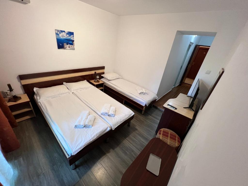 Postel nebo postele na pokoji v ubytování Claudia