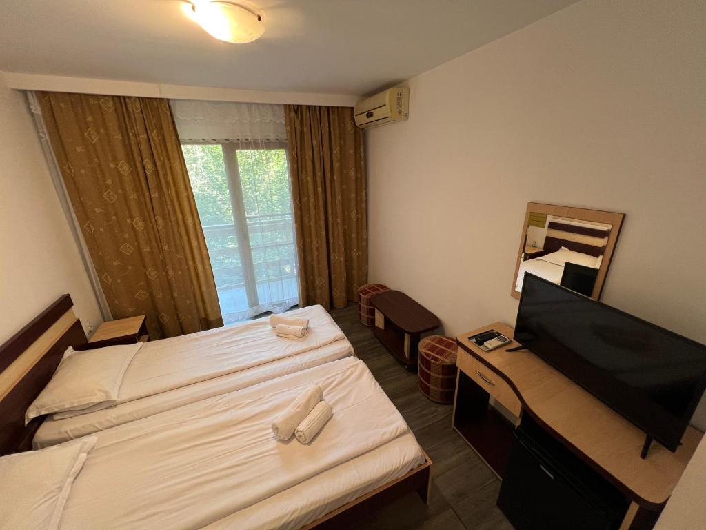 Postel nebo postele na pokoji v ubytování Claudia