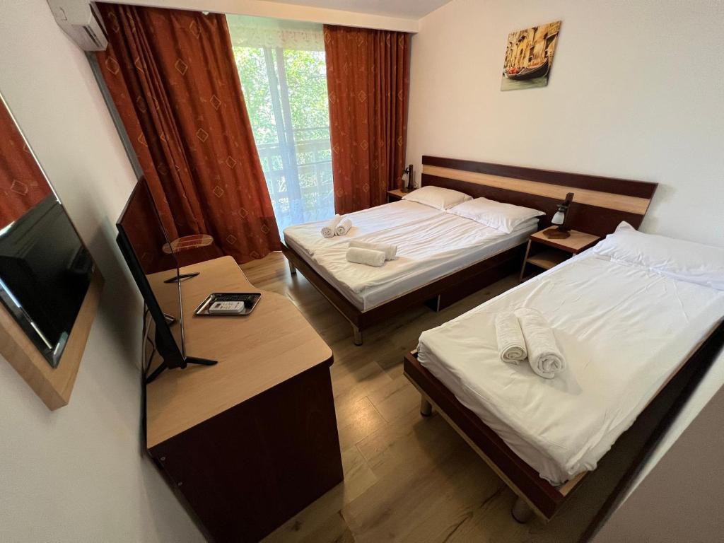 Postel nebo postele na pokoji v ubytování Claudia