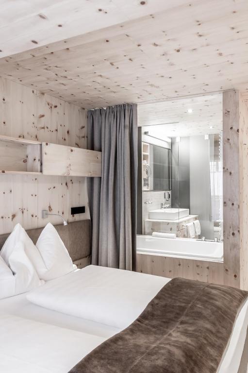 Postel nebo postele na pokoji v ubytování Hotel Olympia