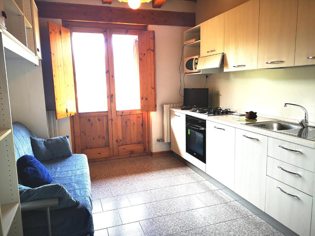 Kuchyň nebo kuchyňský kout v ubytování Giò Appartamenti Vacanze