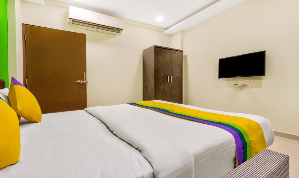 TV a/nebo společenská místnost v ubytování Itsy Hotels Carnival Inn