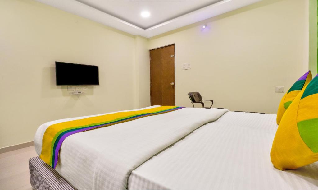 TV a/nebo společenská místnost v ubytování Itsy Hotels Carnival Inn