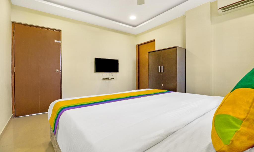 Postel nebo postele na pokoji v ubytování Itsy Hotels Carnival Inn