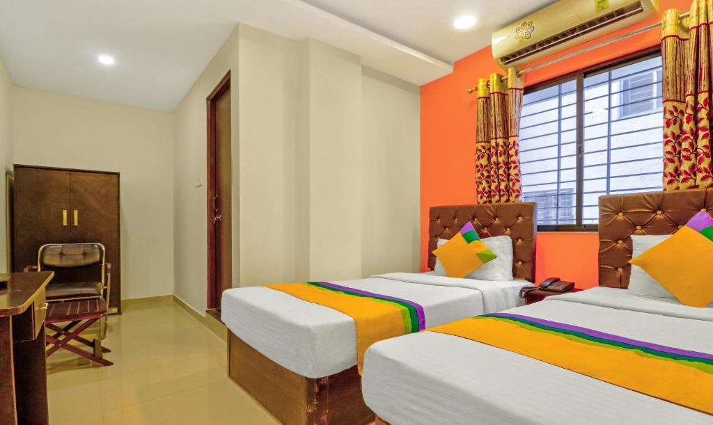 Postel nebo postele na pokoji v ubytování Itsy Hotels Carnival Inn