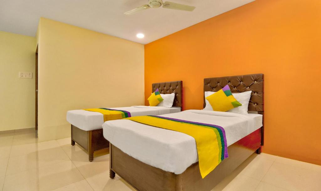 Postel nebo postele na pokoji v ubytování Itsy Hotels Carnival Inn