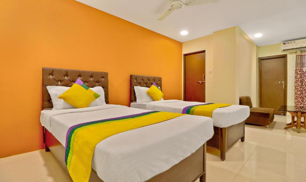 Postel nebo postele na pokoji v ubytování Itsy Hotels Carnival Inn