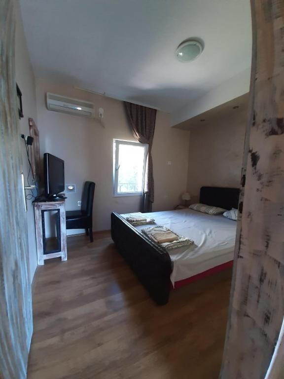 Postel nebo postele na pokoji v ubytování Casa de Laza Apartments