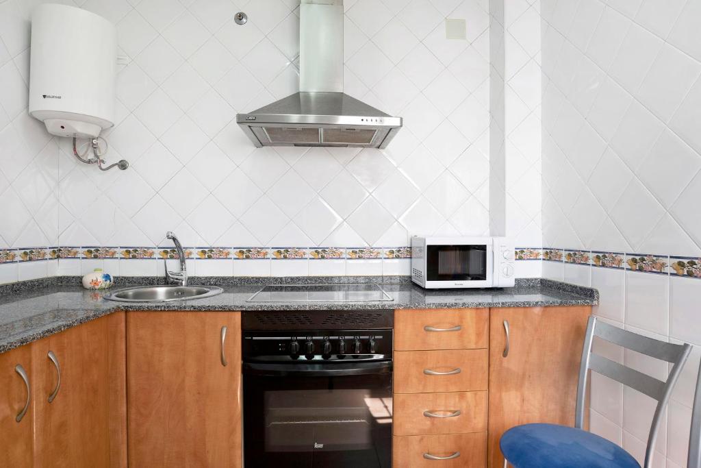 Kuchyňa alebo kuchynka v ubytovaní Apartamento Azucenas