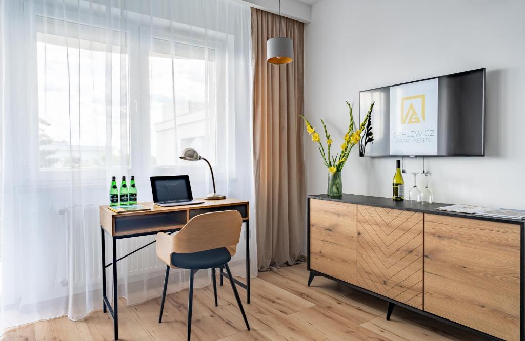 TV a/nebo společenská místnost v ubytování Grelewicz Apartments- MyPleasure