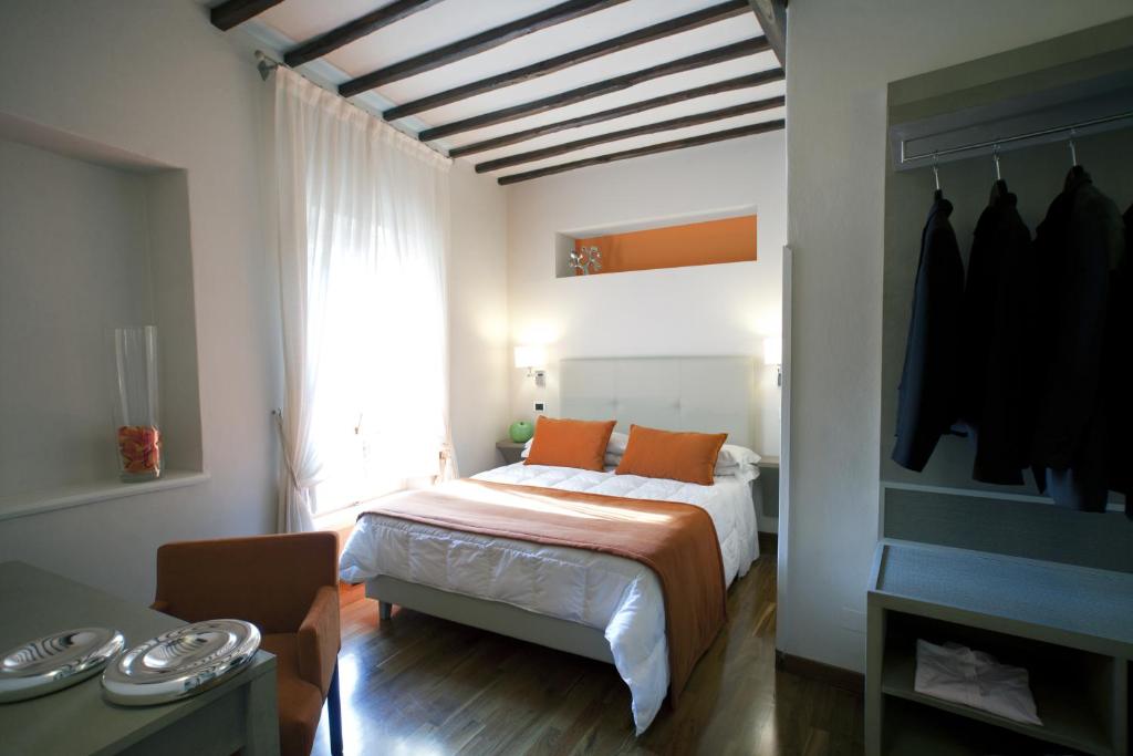 Postel nebo postele na pokoji v ubytování Hotel Charleston