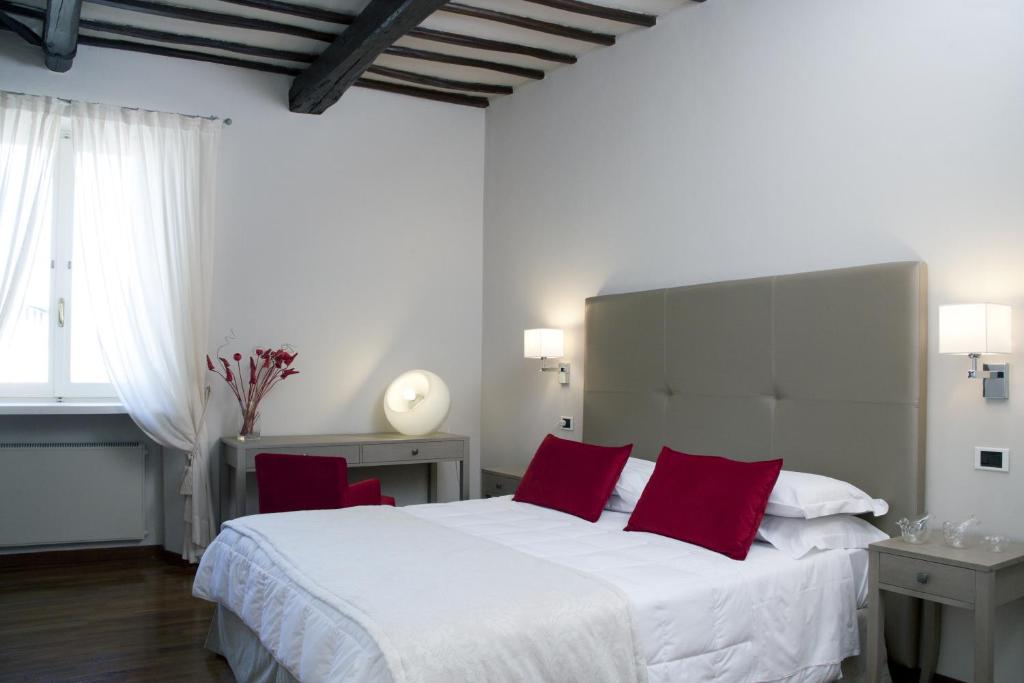 Postel nebo postele na pokoji v ubytování Hotel Charleston