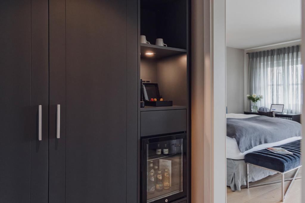Kuchyň nebo kuchyňský kout v ubytování Hotel Caraleon