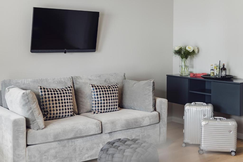 TV a/nebo společenská místnost v ubytování Hotel Caraleon