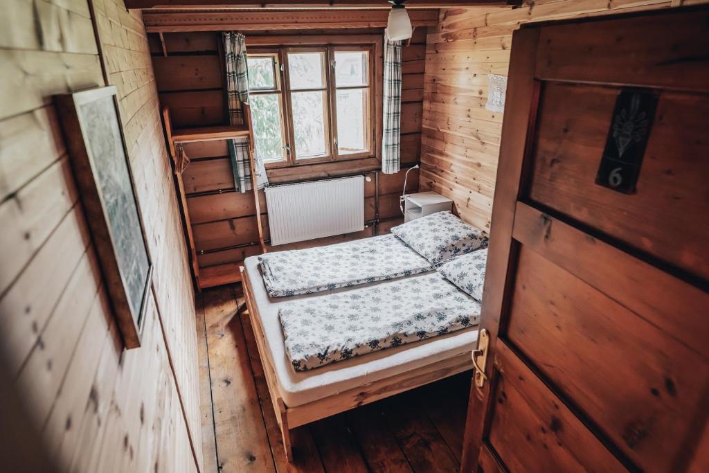 Posteľ alebo postele v izbe v ubytovaní Chata MTB