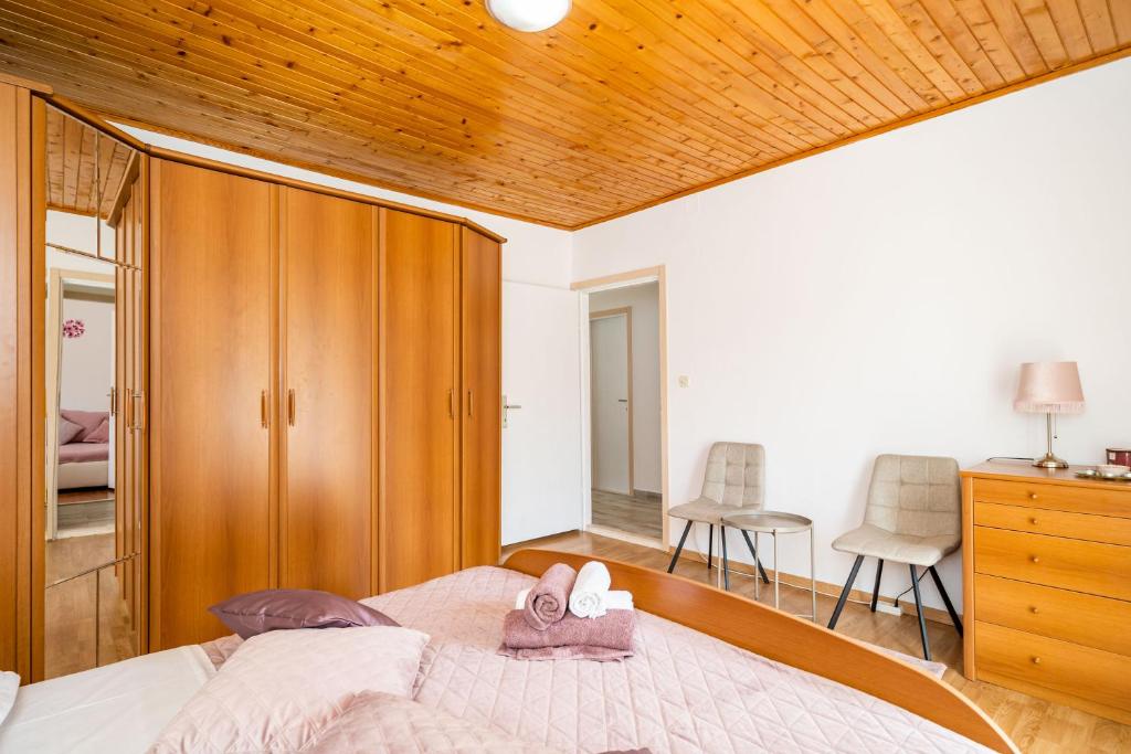 Posteľ alebo postele v izbe v ubytovaní Marija Apartment
