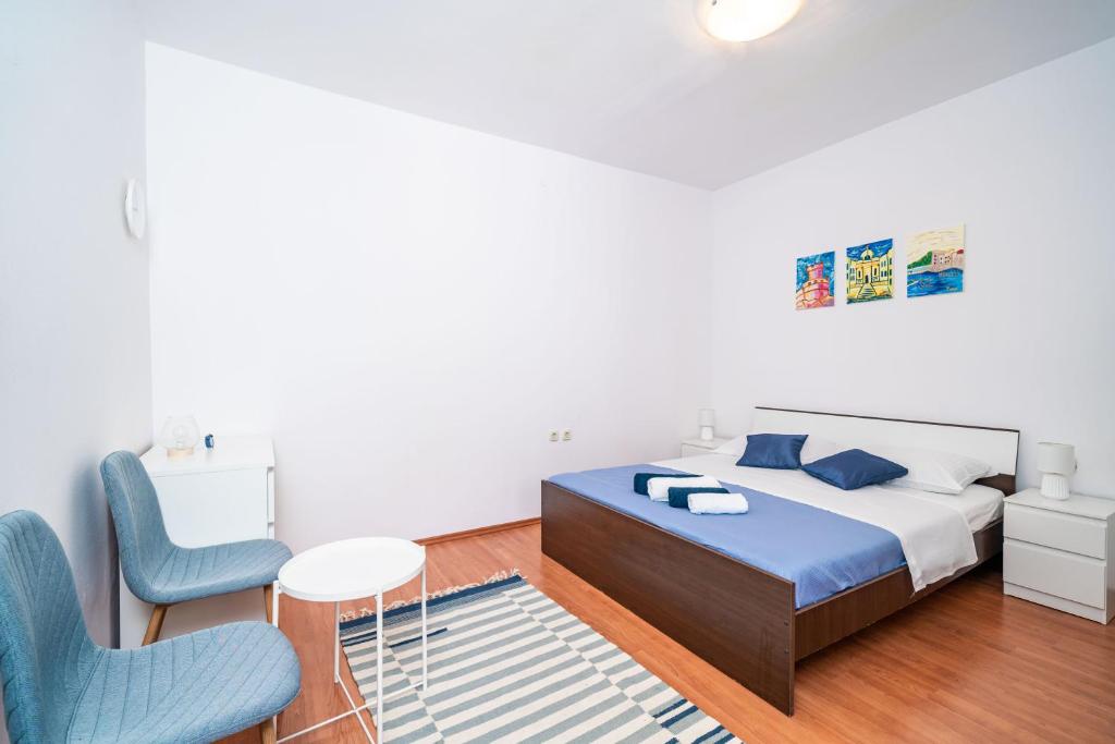 Posteľ alebo postele v izbe v ubytovaní Marija Apartment
