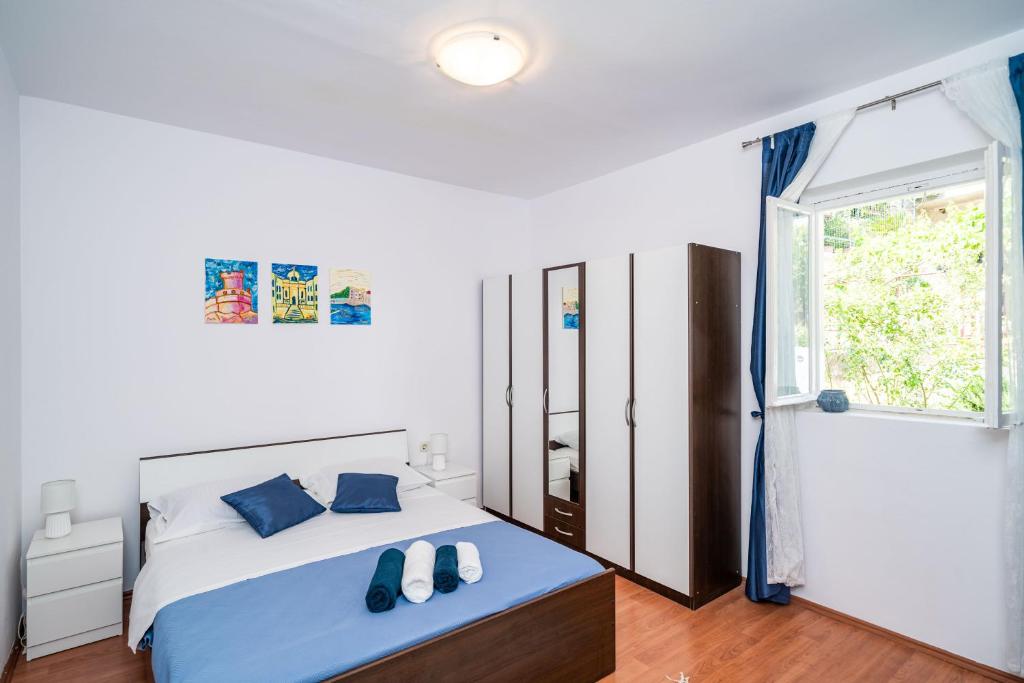 Posteľ alebo postele v izbe v ubytovaní Marija Apartment