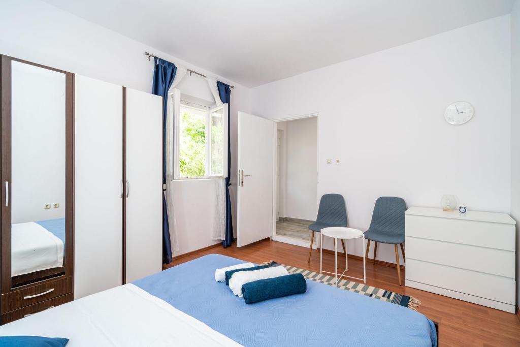 Posteľ alebo postele v izbe v ubytovaní Marija Apartment