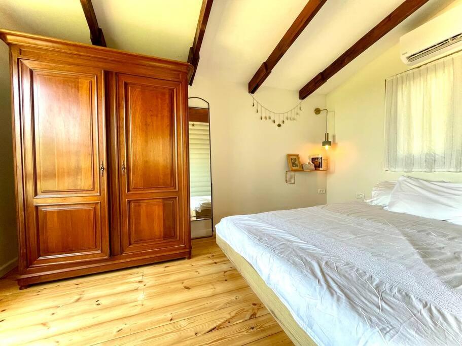 Postel nebo postele na pokoji v ubytování Solara Cabin