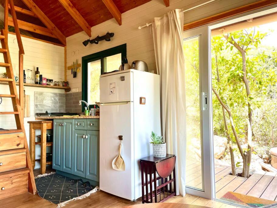 Kuchyň nebo kuchyňský kout v ubytování Solara Cabin
