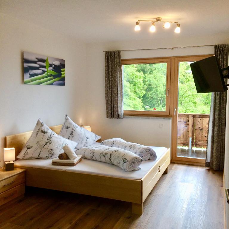 Posteľ alebo postele v izbe v ubytovaní Ferienwohnung Leo