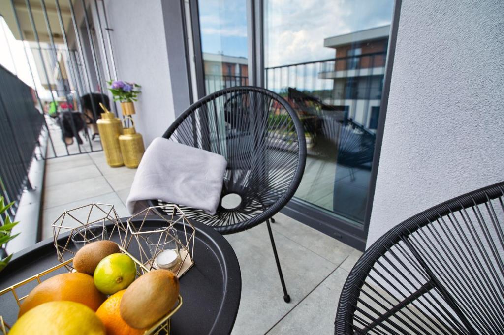 Balkón alebo terasa v ubytovaní ApartPark Centrum Zator