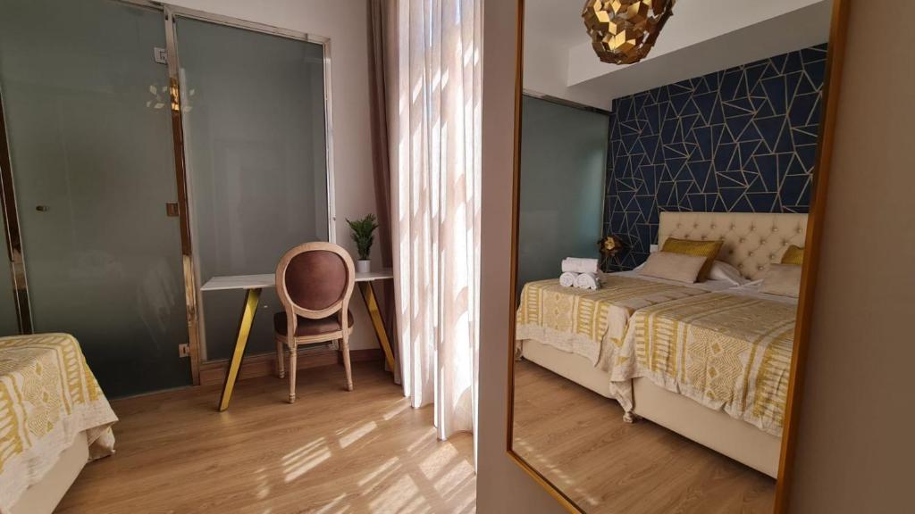 Posteľ alebo postele v izbe v ubytovaní Expoholidays - Plaza Vieja con PARKING gratis