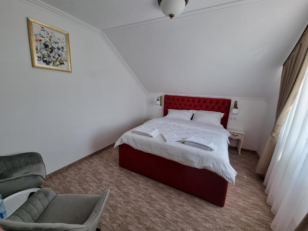 Postel nebo postele na pokoji v ubytování Mini Paradis