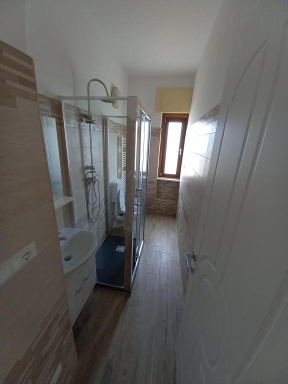 A bathroom at Serravalle Apartment