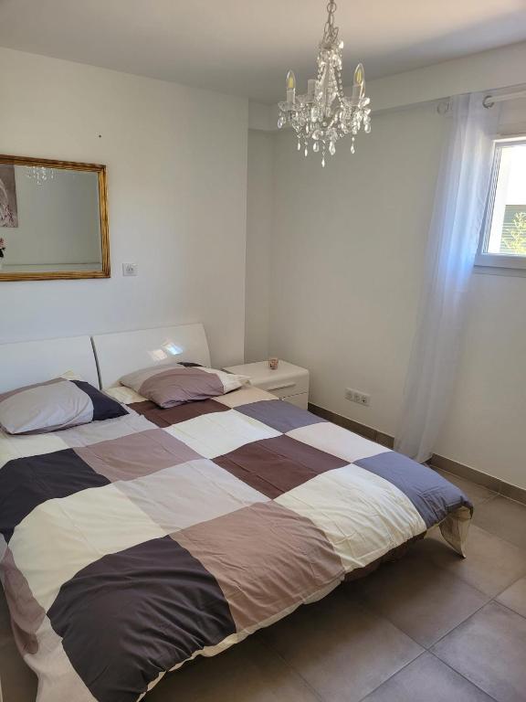 Posteľ alebo postele v izbe v ubytovaní Chambres & Suites Villa architecte