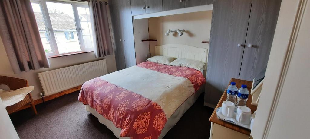 Postel nebo postele na pokoji v ubytování Conn Oriel B&B