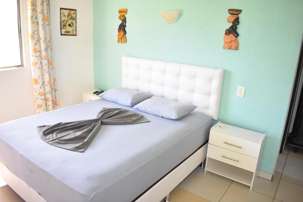 Postel nebo postele na pokoji v ubytování Hotel Pousada Rancho Fundo