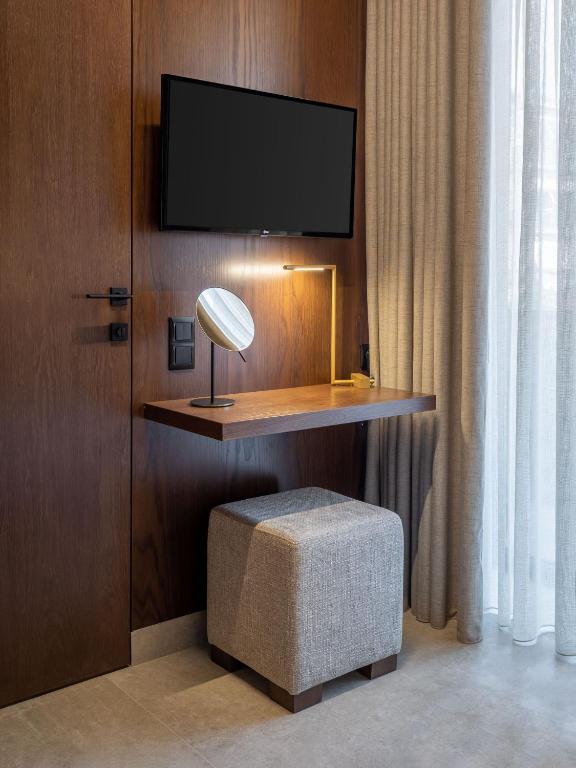 TV a/nebo společenská místnost v ubytování ASKLIPIOS LUXURY ROOMS