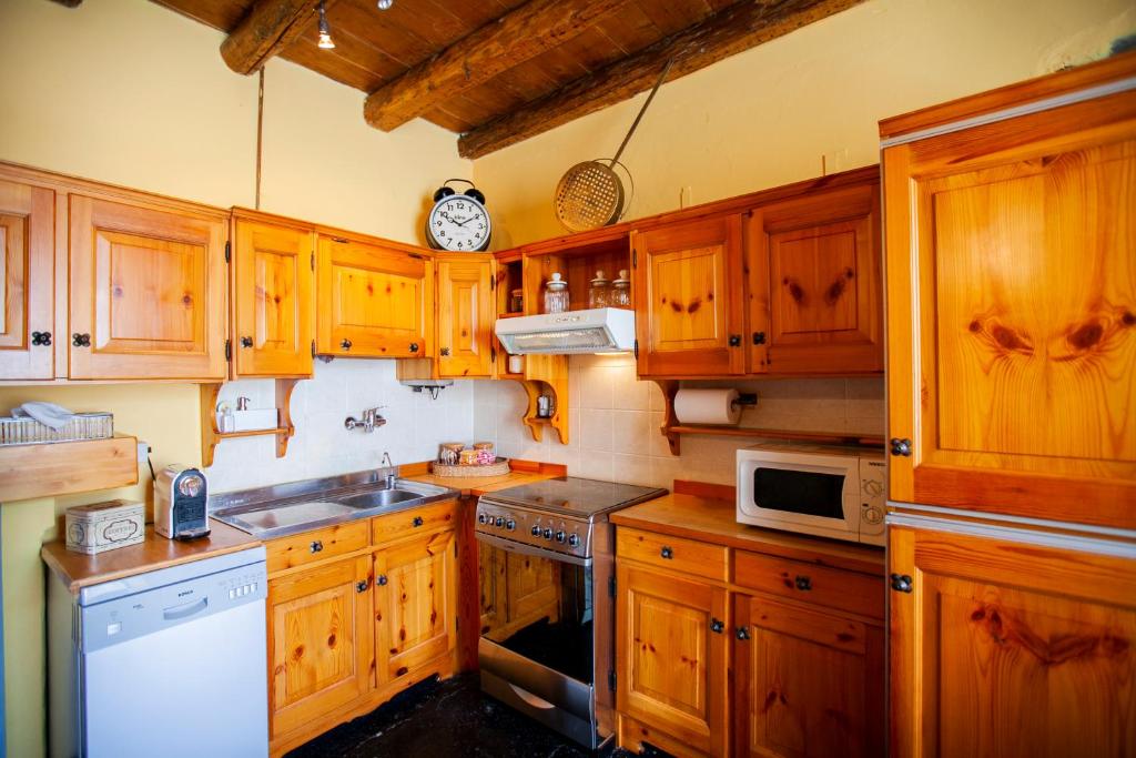 Kuchyň nebo kuchyňský kout v ubytování Casa di MOMO